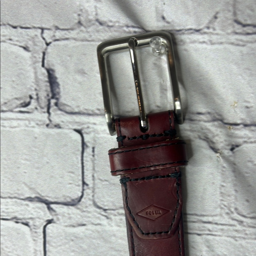 Fossil Brown Leather Bag with Structured Design and Glossy Finish